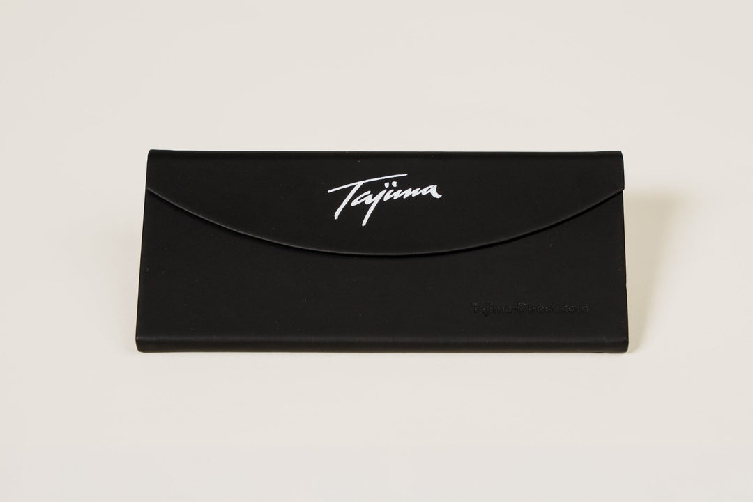 Tajima foldable sunglass case closed flat showing Tajima logo and Tajima-Direct.com branding