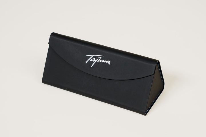 Tajima foldable tri-fold sunglass case standing upright in triangular protective position