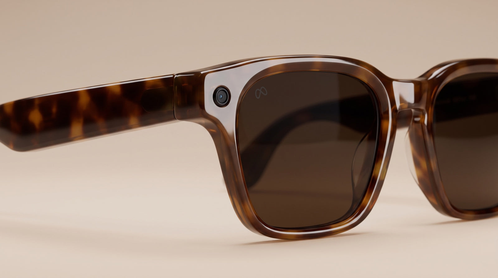 Close-up of Meta smart glasses showing the corner camera and a premium Tajima lens