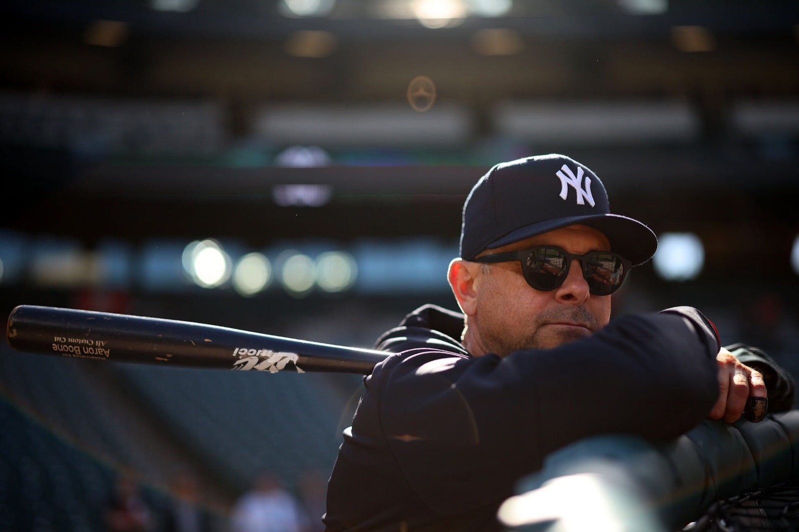 Aaron Boone observing batting practice in basn5 Highway 1 sunglasses with Gray 15 Tajima polarized lenses