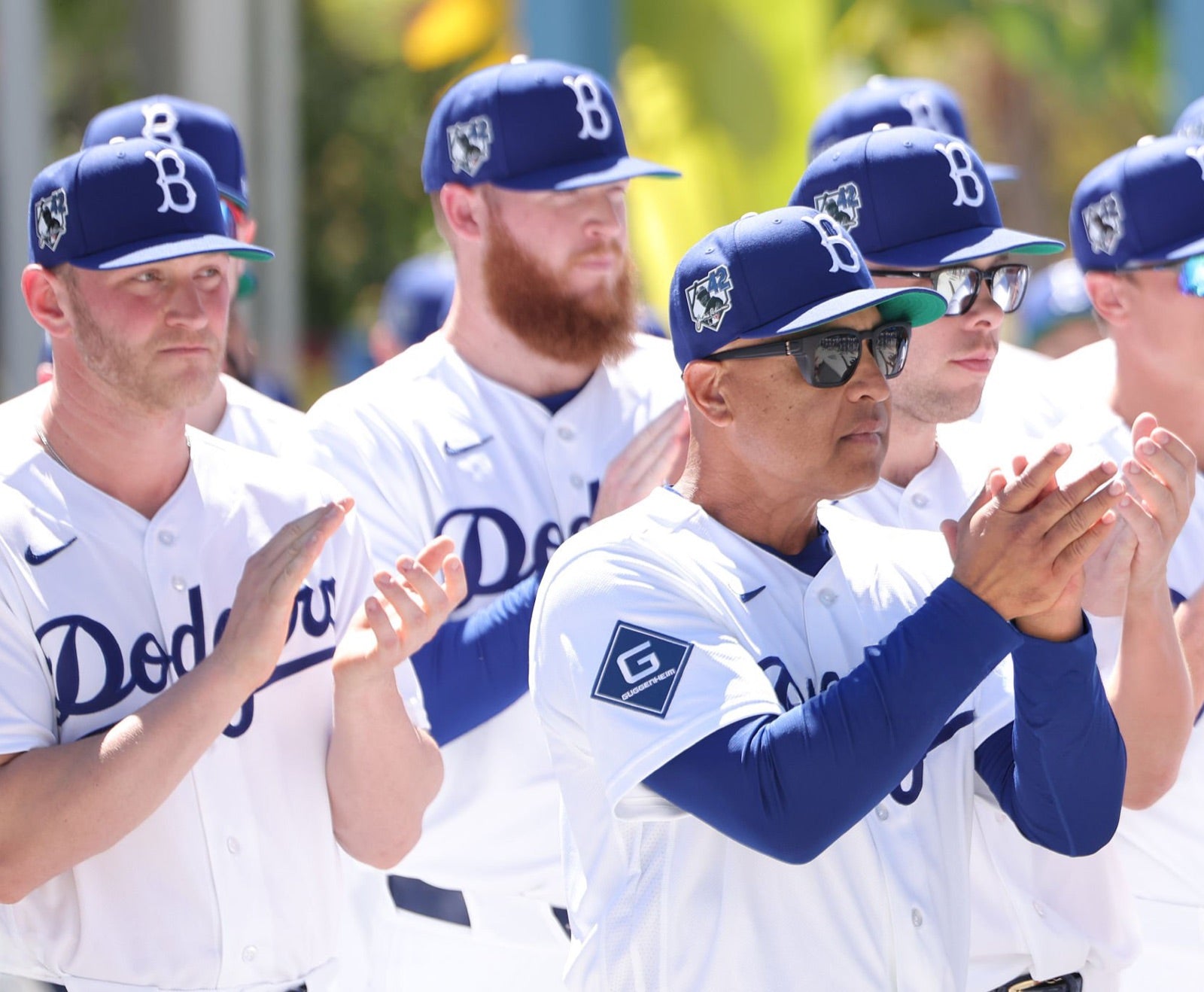 Dave Roberts wearing the basn5 Davenport frame with Gray 15 lens tint alongside his team on Jackie Robinson Day 2026